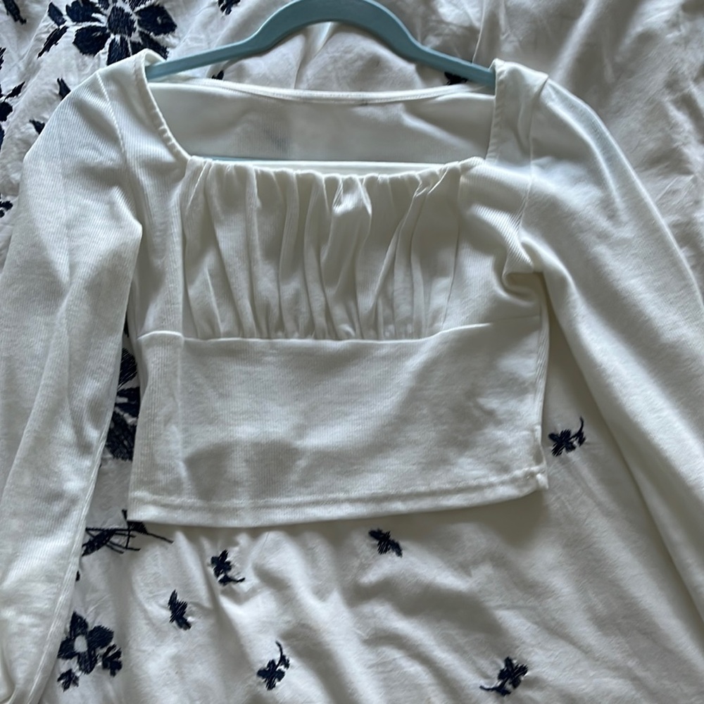 White long sleeve top